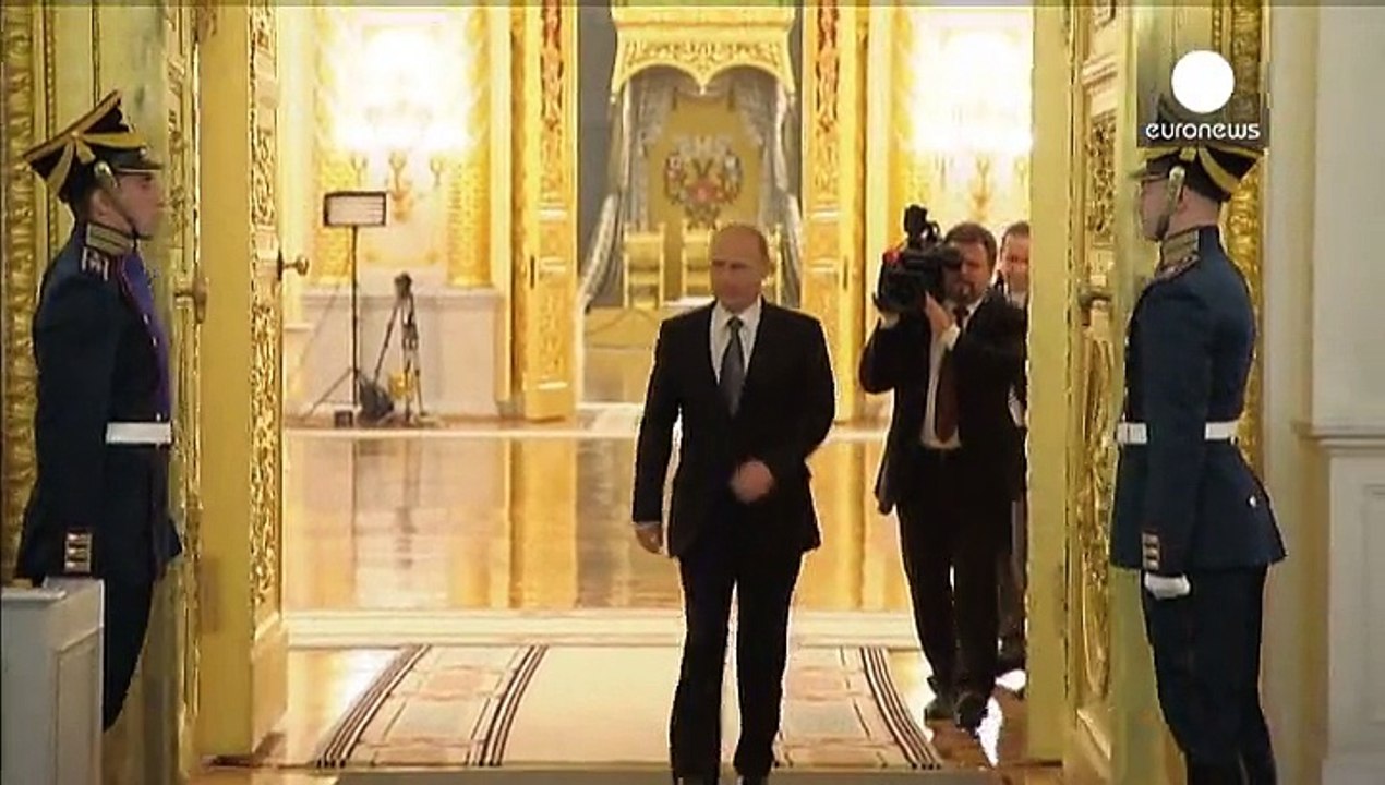 Putin's annual parliamentary address promises Russia will overcome all challenges