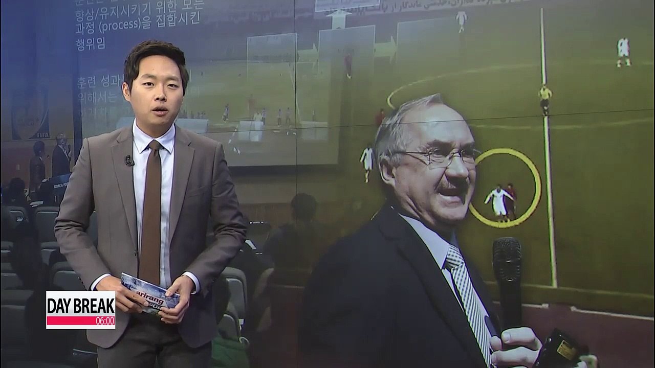 Uli Stielike holds presentation during technical conference