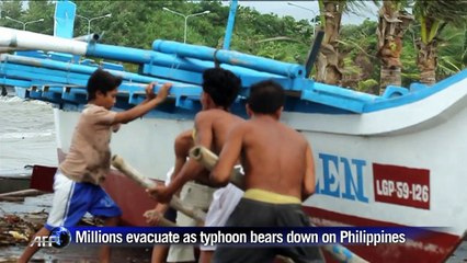 Millions evacuate as typhoon bears down on Philippines