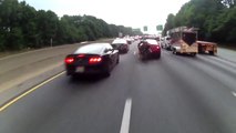 Dumb motorcyclist crashes while overtaking cars and lane splitting