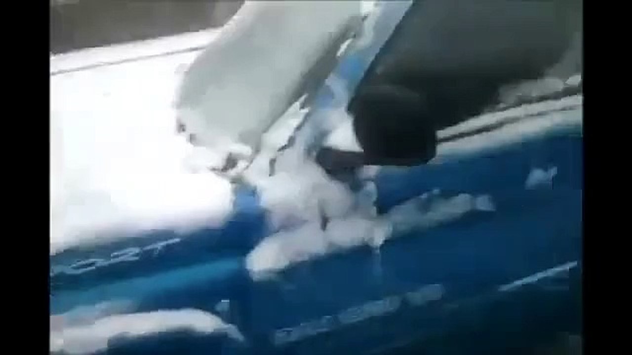 Cars slip, slide and spin On Icy Street