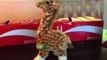 'Devil' Giraffe Toy Makes a Creepy New Friend