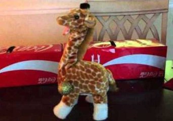 'Devil' Giraffe Toy Makes a Creepy New Friend