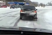 No spare wheel, this russian driver uses a luge instead! Insane