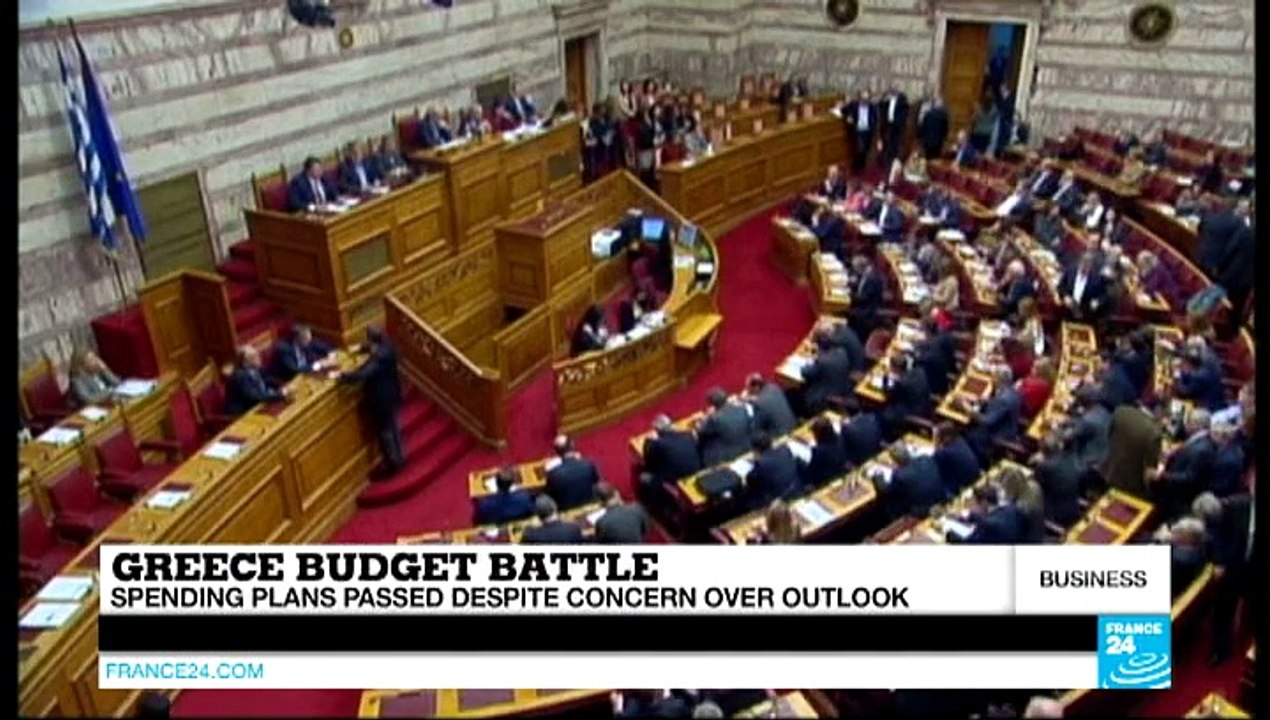 Greece passes budget but faces EU pressure