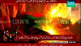 Tsunami torched PTI party flag during Faisalabad protest