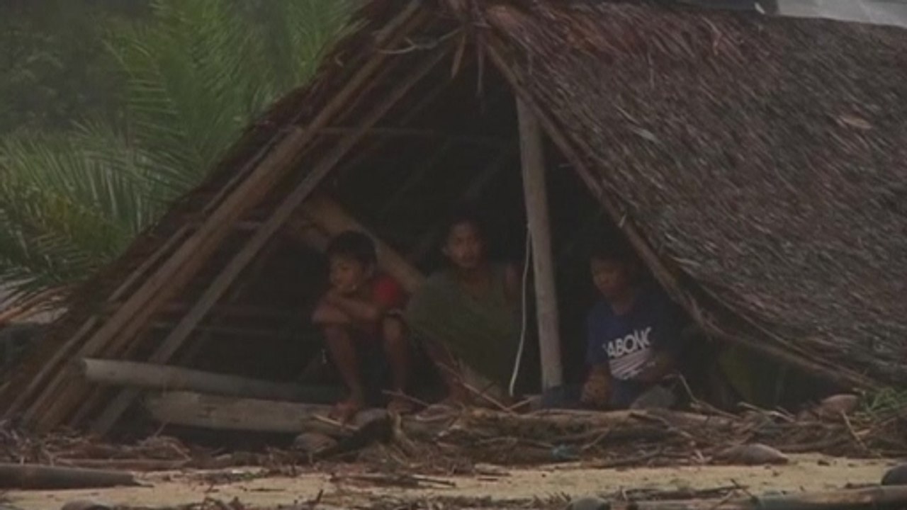 Typhoon Hagupit weakens