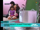 Syrian society unites to aid refugees