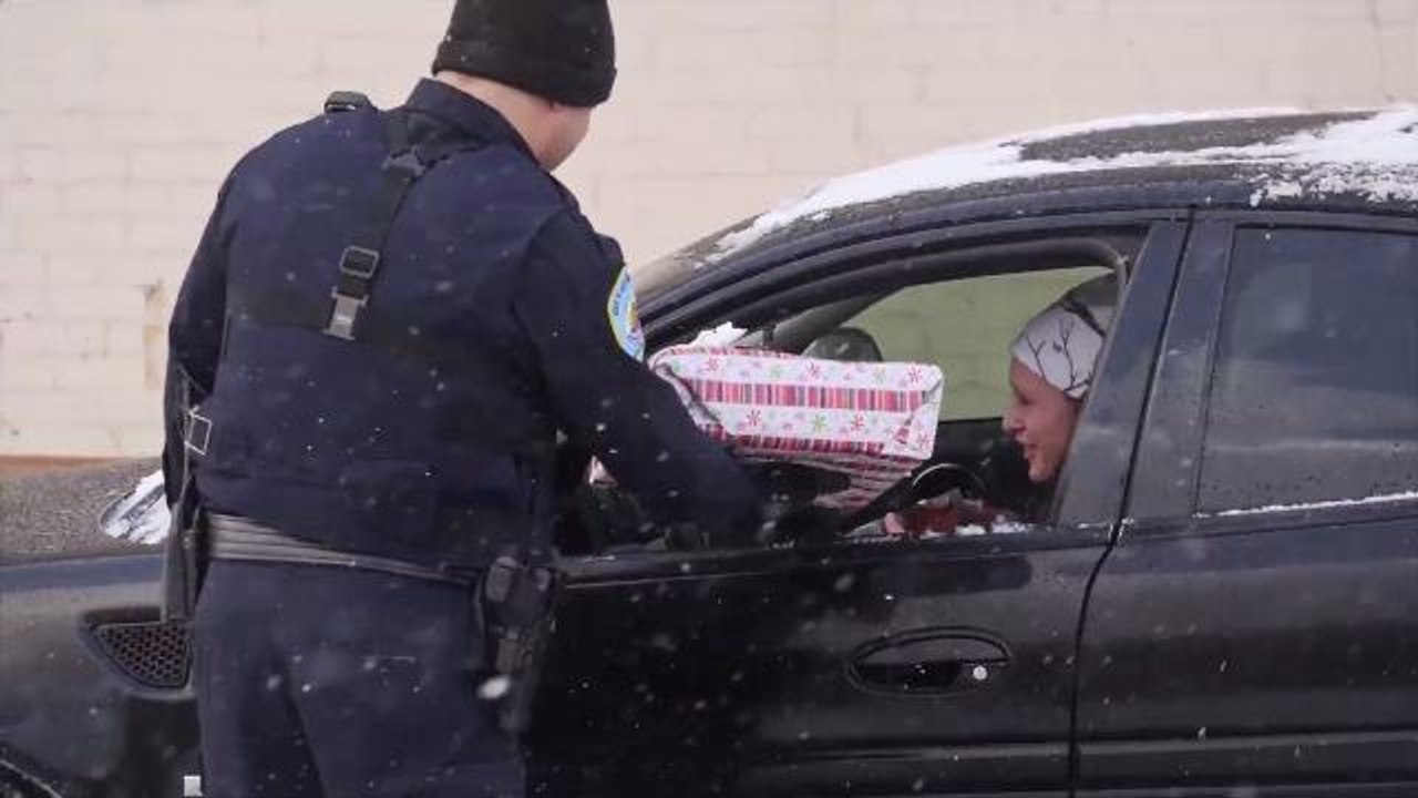 Cops Pull Over Drivers and Surprise with Christmas Presents