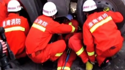 Man rescued after being dragged under the wheels of a truck