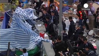 Resignation as Hong Kong clears main pro-democracy protest site