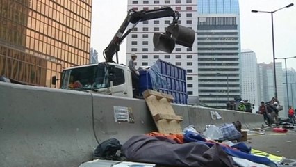 Hong Kong police dismantle protest site