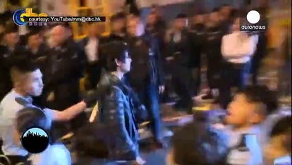 Hong Kong pro-democracy camp cleared as protesters remain defiant