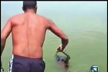 Baby found in a plastic bag floating in water