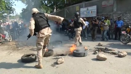 Violence breaks out as Haitians rally to oust Martelly's government