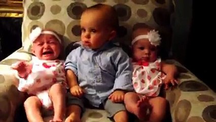 Baby meets twin sisters for the first time-Most funny