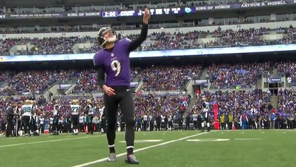 Justin Tucker tests wind with sunflower seeds