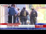 BREAKING NEWS Hostages pressed against window in Sydney cafe