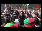 PTI supporters stop motorcyclists near Lahore's GPO chowk