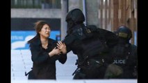 Hostages seen running from cafe under seige