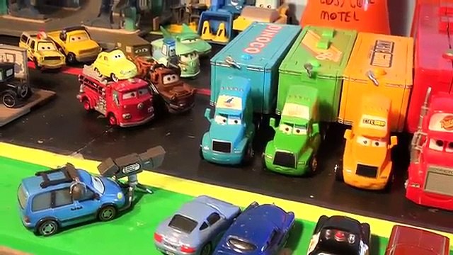 Pixar Cars The Haulers with Mack, Chick Hicks, The King, Lightning McQueen and more in the Show and