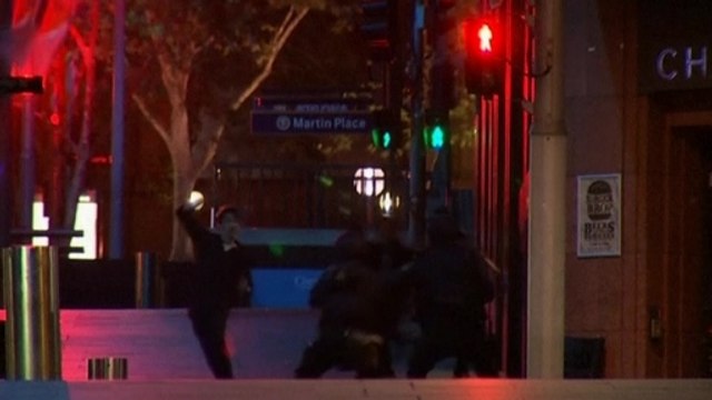 A group of hostages run from Sydney cafe hostage situation