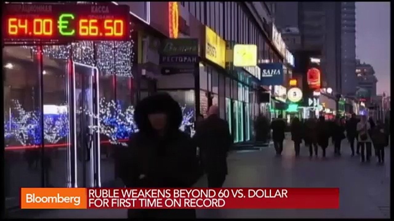 Ruble Weakens Beyond 60 vs. Dollar for First Time