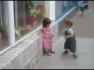 Little Baby Boy Kissing Baby Girl