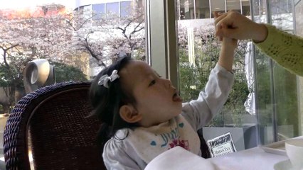 Girl Pretending Baby