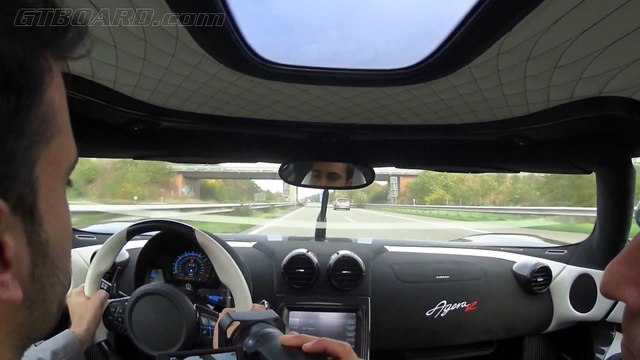 Supercar Koenigsegg Agera R 340+ kmh (215+ mph) casual driving towards german Highway
