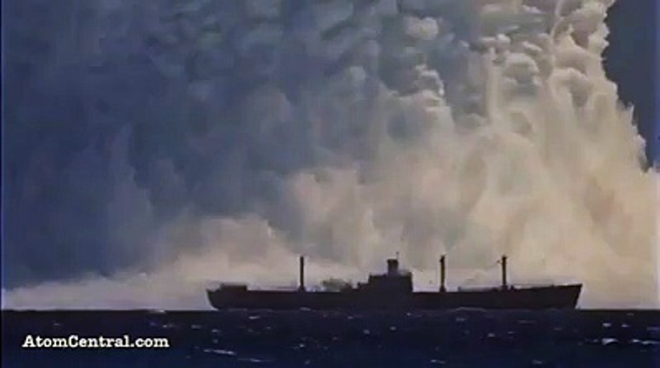 atom bomb blast in sea.