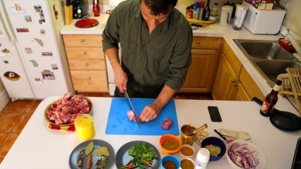 Cooking blackened goat (kaalo maasu)
