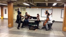 impromptu performance of ballet in the subway in New York