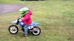 Landon rides dirt bike with no training wheels