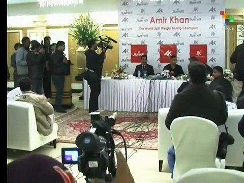 Boxer Amir Khan donates shorts valued at 30,000 pounds sterling