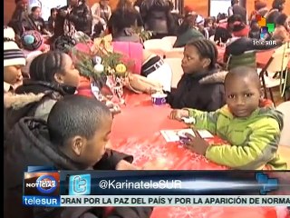 Organizan cena de navidad para niños inmigrantes en Nueva York