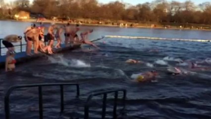 Swimmers take the icy plunge for annual Christmas Day swim