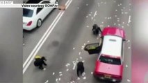 Un camion fait tomber deux millions d'euros de billets dans la rue