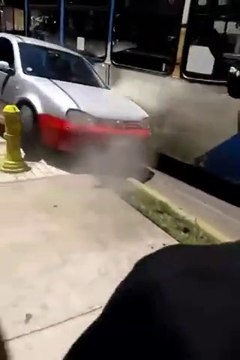 Don't piss off a Bus driver : crazy crashof a bus into a chav car. HILARIOUS!