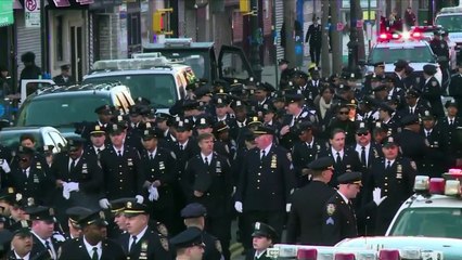 Obsèques d'un des policiers tués à New York