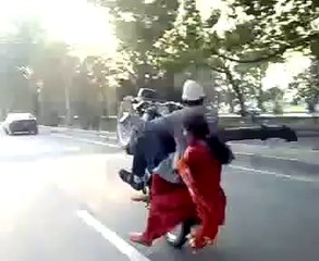 HOT girl falling from bike doing one wheeling