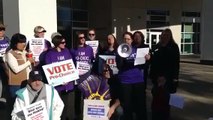 MoveOn member Jamie C delivering her petition to The Denver Post