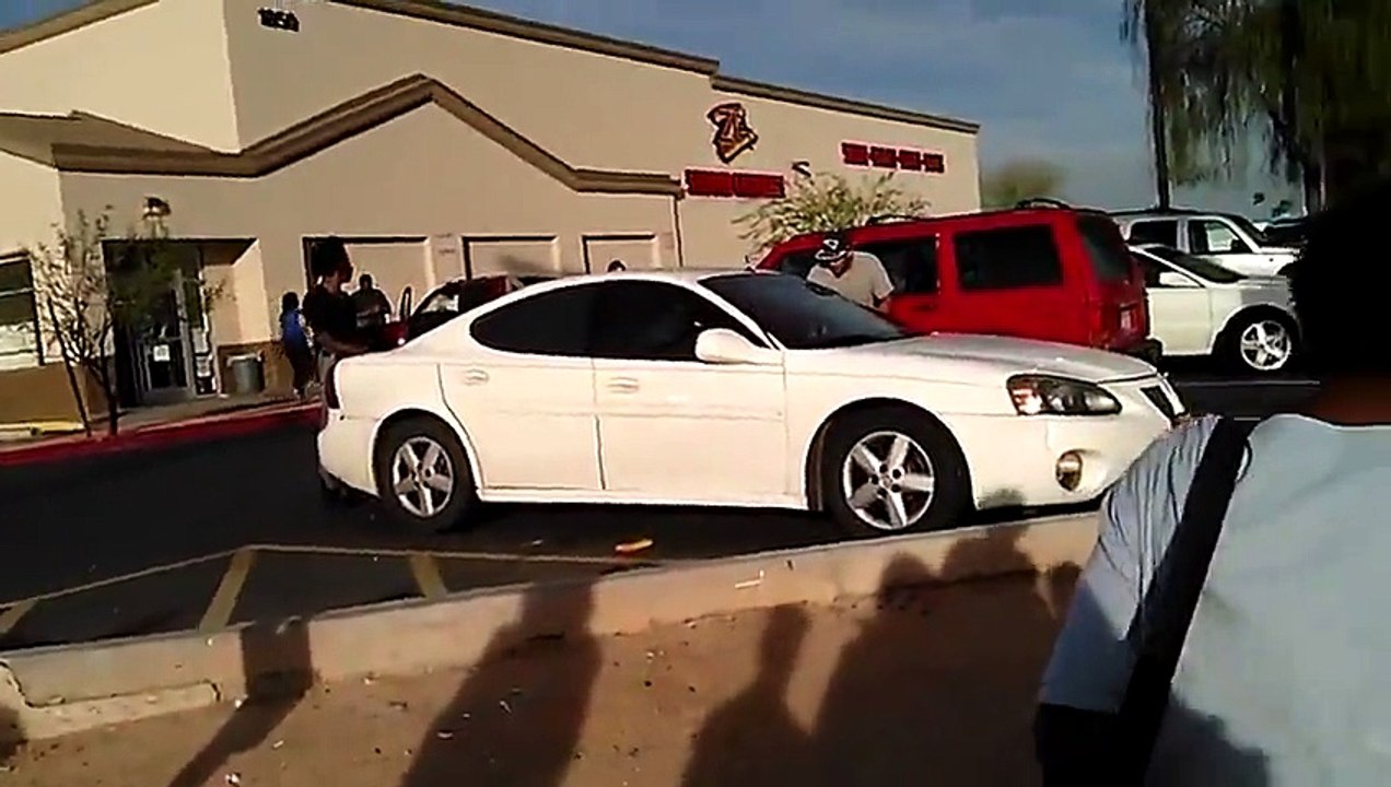 Crazy ROAD RAGE : Guy hangs on to car and almost gets killed