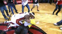 LeBron tackles Heat fan who hits $75,000 shot!