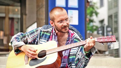 Sleet / Day of a Street Musician / live performance in the city of Darmstadt