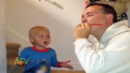 Reaction Of A Baby while Watching his father eating Chili