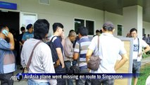 Relatives in Indonesia, Singapore await news of missing plane