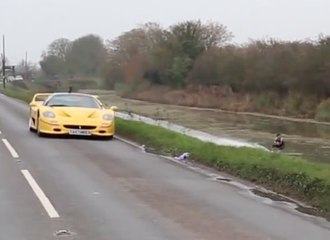 A Ferrari F50  towing the Pro Wakeboarder Jorge Gill