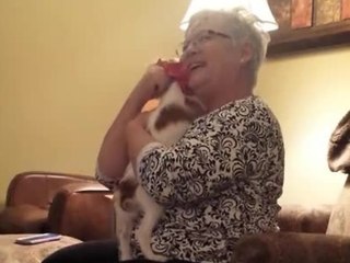 Grandma's priceless reaction to Christmas puppy