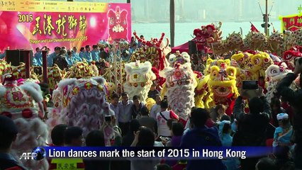 Lion dances mark the start of 2015 in Hong Kong